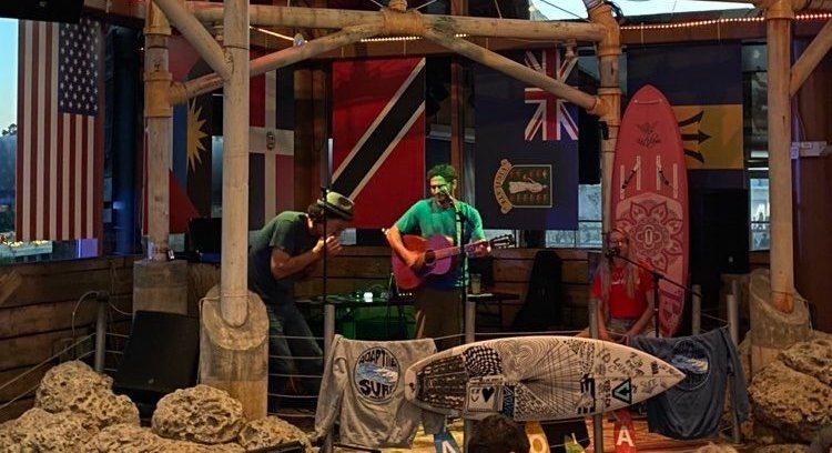 rick cannon and dawn patrol playing music on stage at margaritaville myrtle beach for ASP fundraiser